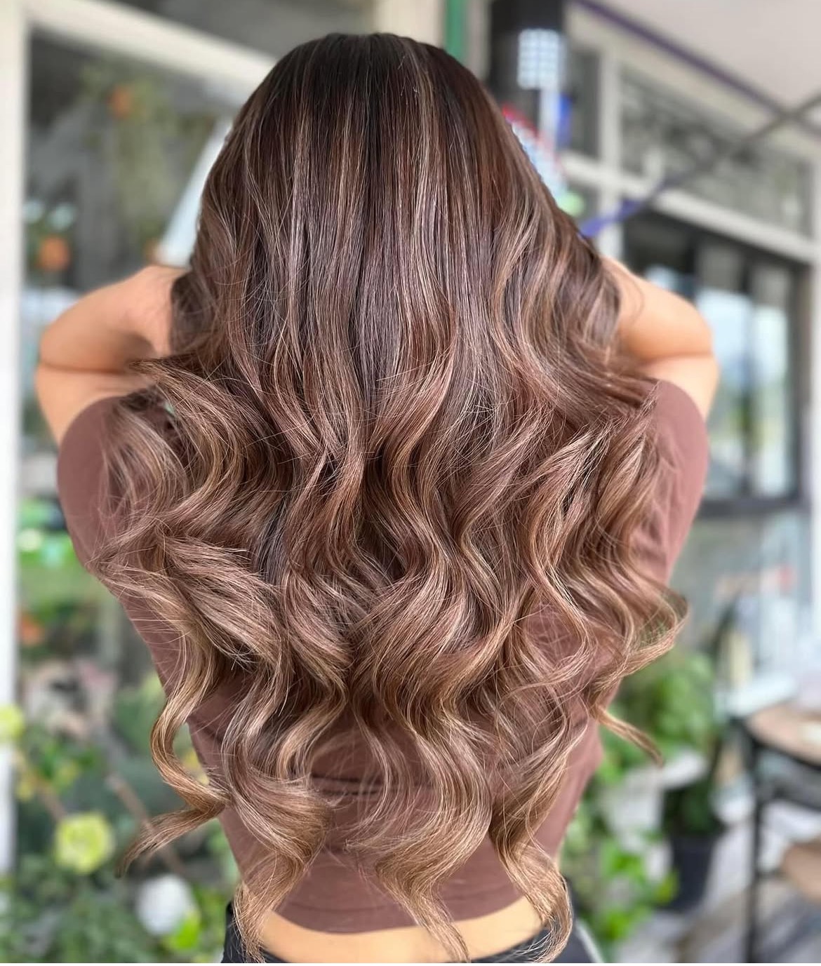 Hand-painted balayage artistry by creative hairstylist at Salon Era Vancouver