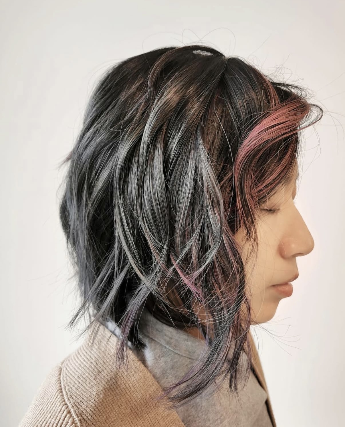 Creative women's haircut with balayage by Salon Era Vancouver luxury stylist