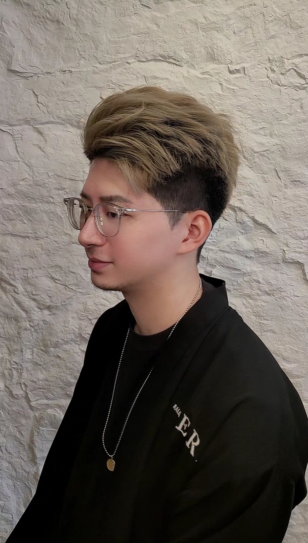 Modern men's haircut by senior hairstylist at Salon Era Vancouver